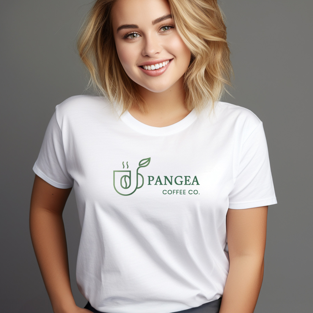 Woman wearing the Pangea Coffee unisex graphic tee in heather sand, smiling with a cup of coffee — soft, minimalist shirt representing clean, low-acid, allergen-free coffee culture.
