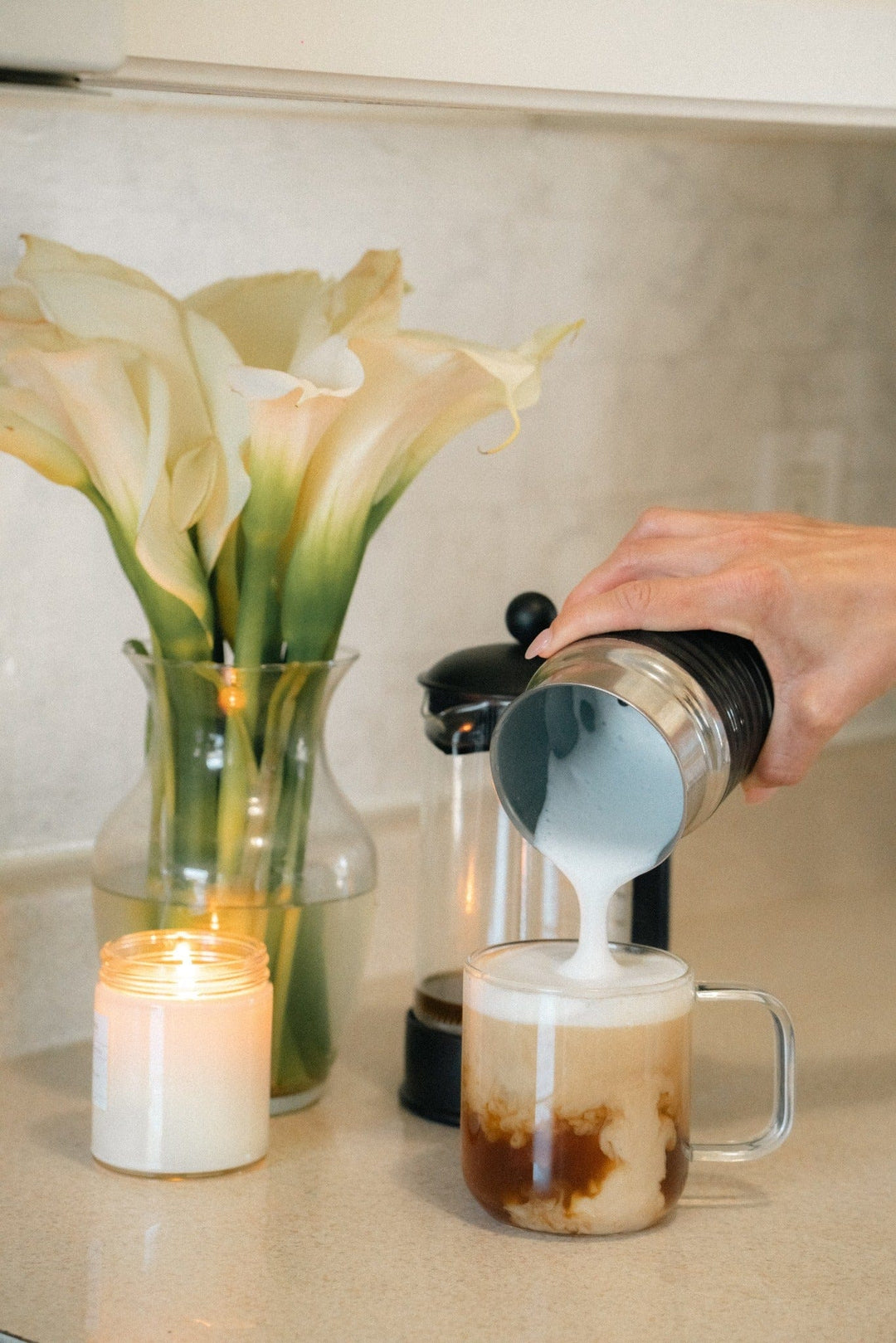 Close-up of a creamy, frothy cup of Pangea low acid coffee with a smooth finish