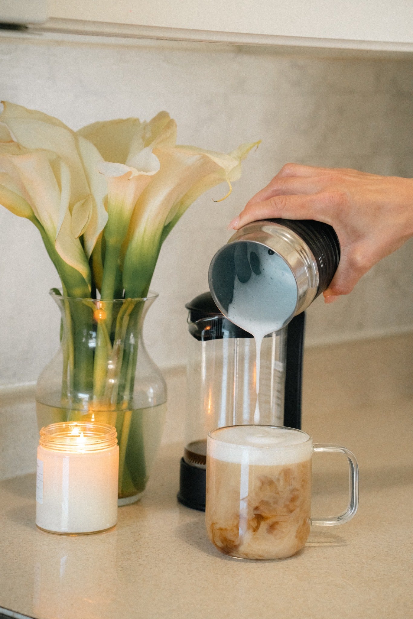 UGC video showing creamy, frothy Pangea Coffee being poured into a mug in a cozy kitchen setting – smooth texture and rich aroma on display.