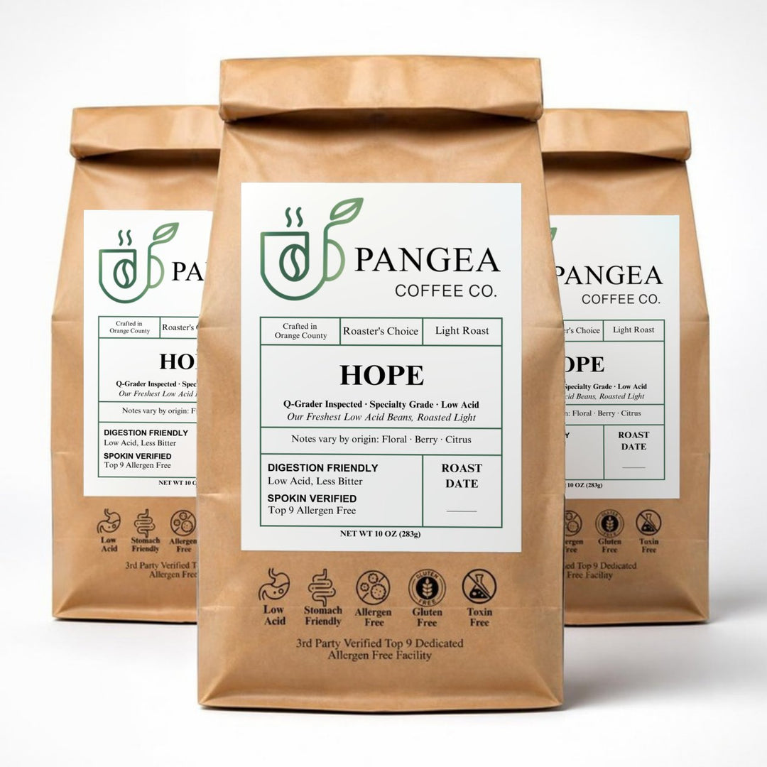 Pangea Hope light roast 3-pack — three 10oz bags of low acid, mold-free, allergen-free light roast coffee on a white background