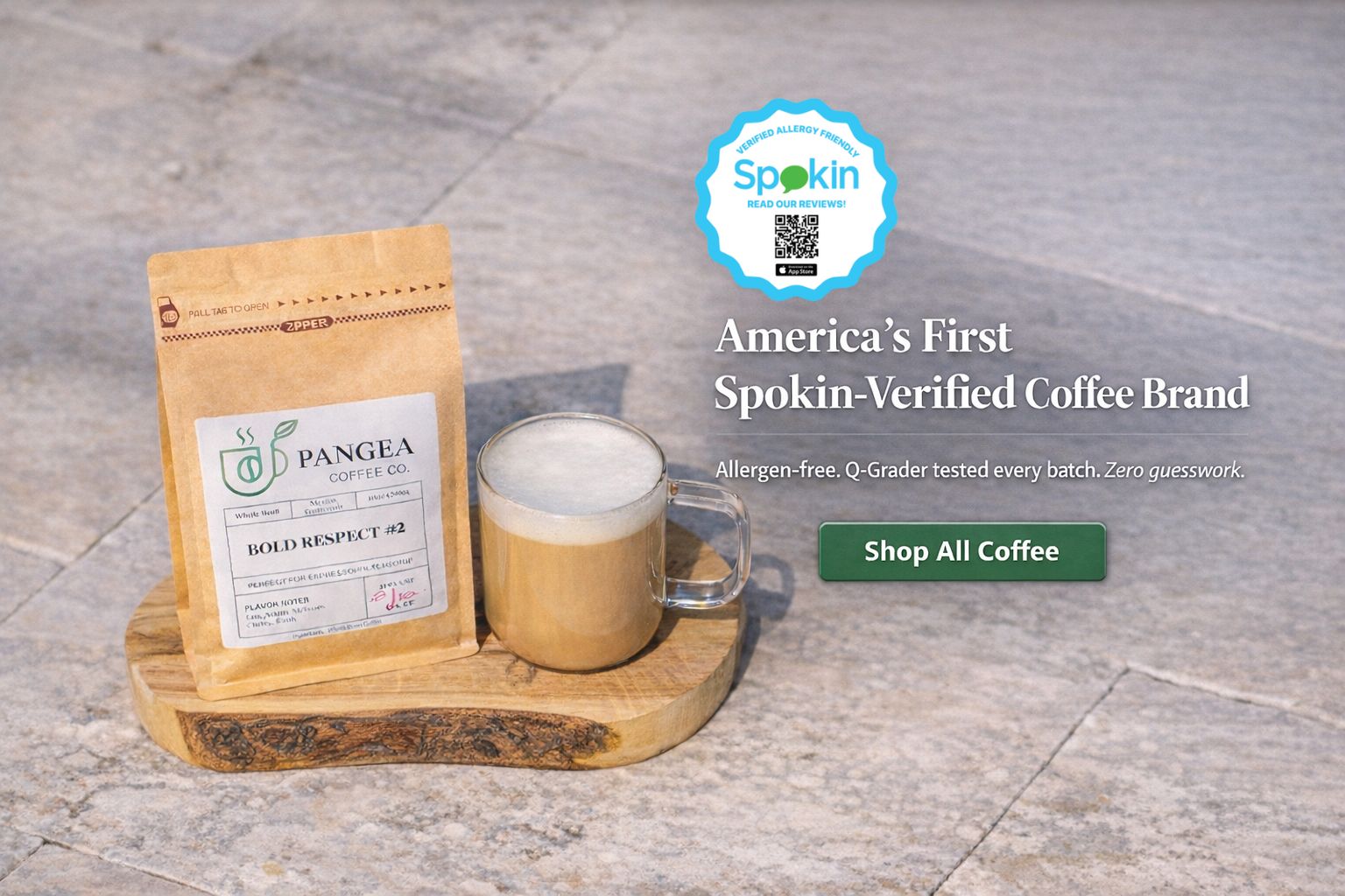 America's first Spokin-verified coffee brand - Pangea Coffee Bold Respect bag with latte on wooden stand, allergen-free Q-grader tested coffee with Spokin verification badge